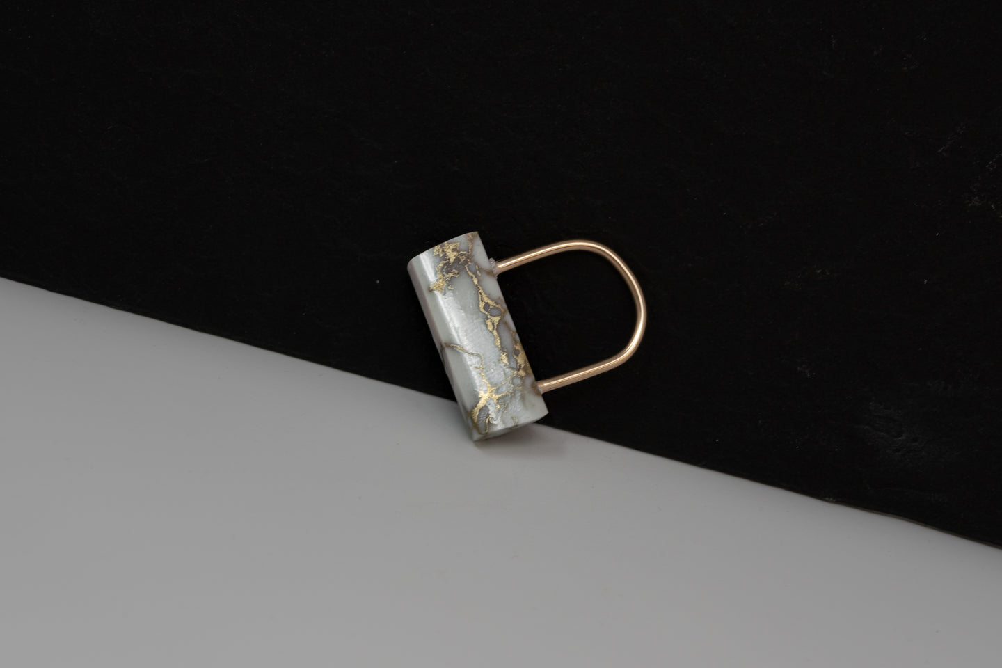 Gold and marble hightop U ring